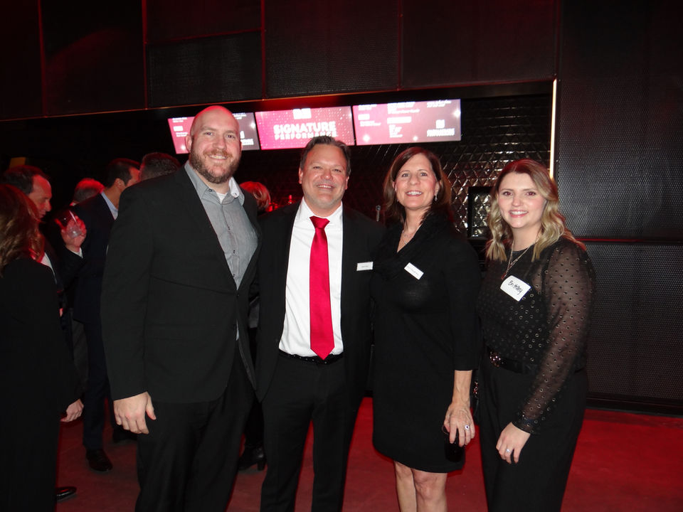 Signature Performance leaders attending a formal company event