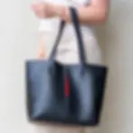 Black with red vegan leather tote bag Kristina on model, handmade everyday shoulder bag from Ukraine