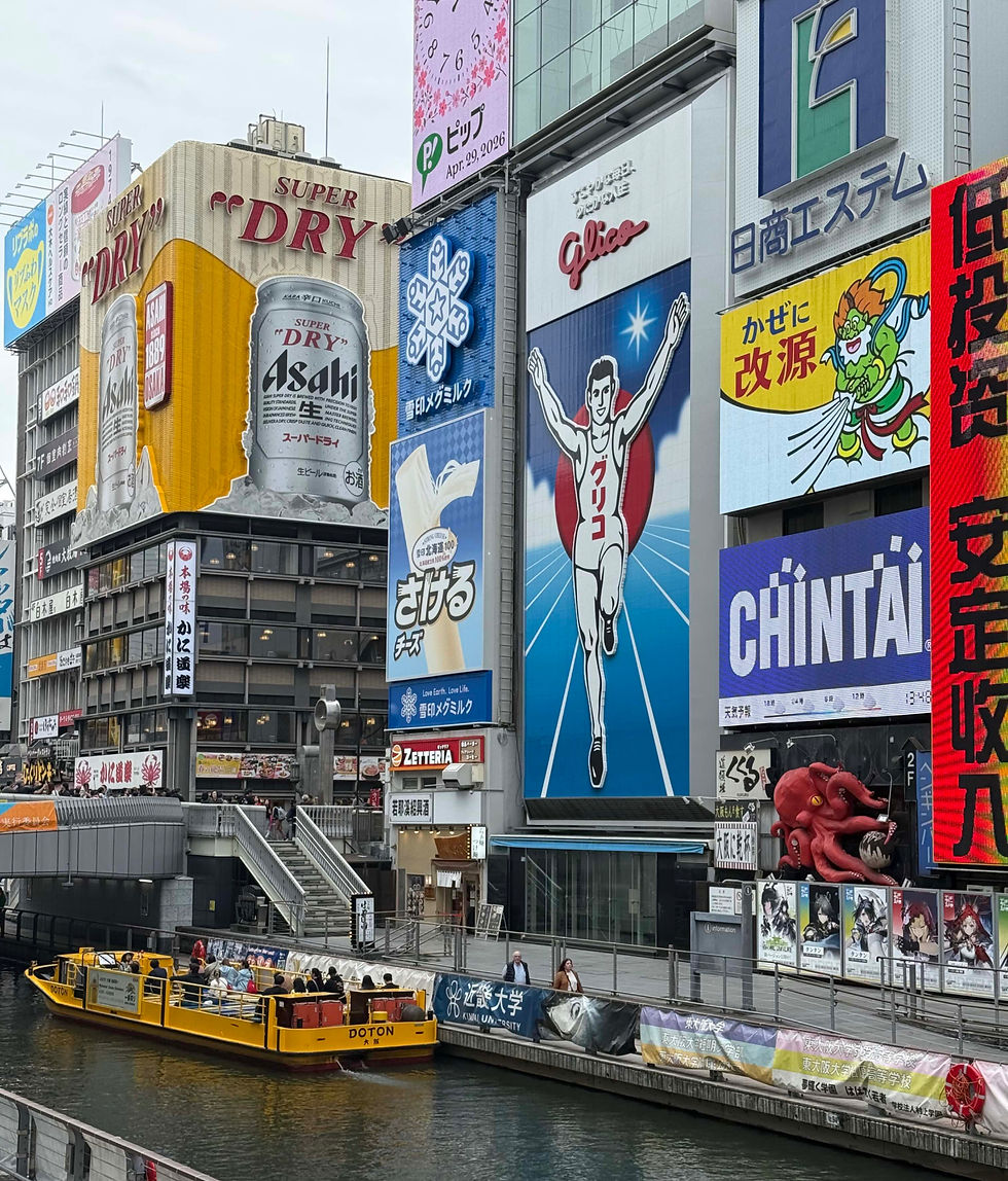 Osaka's famous running man billboard in Dotonburi