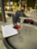 Two glasses of wine atop an outdoor table at Story of Soil.