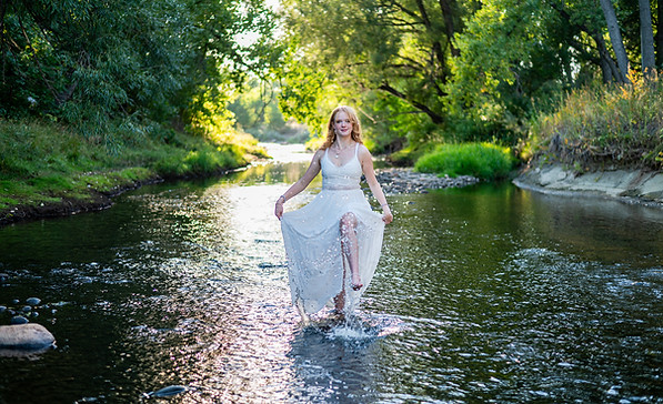 colorado senior portrait in river.jpg
