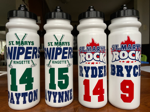 Erin Parsons created these water bottles using permanent vinyl. They include team logos, as well as player name and numbers.