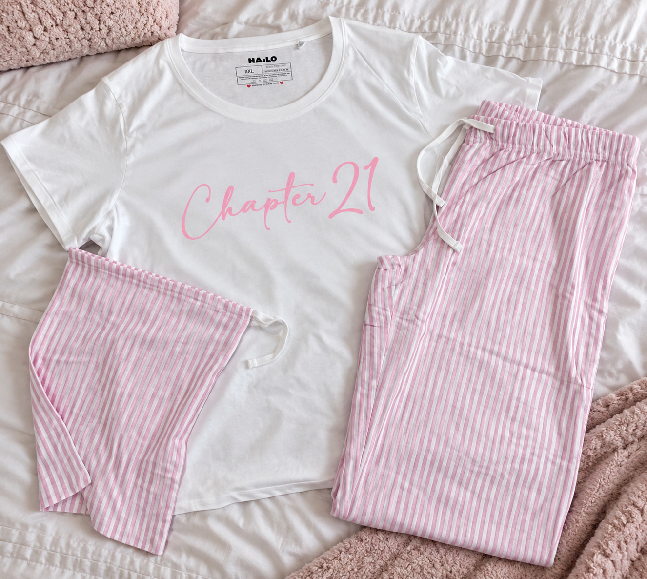 White/pink pyjamas in a bag