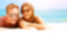Happy Couple in Sunglasses Having Fun on the Beach