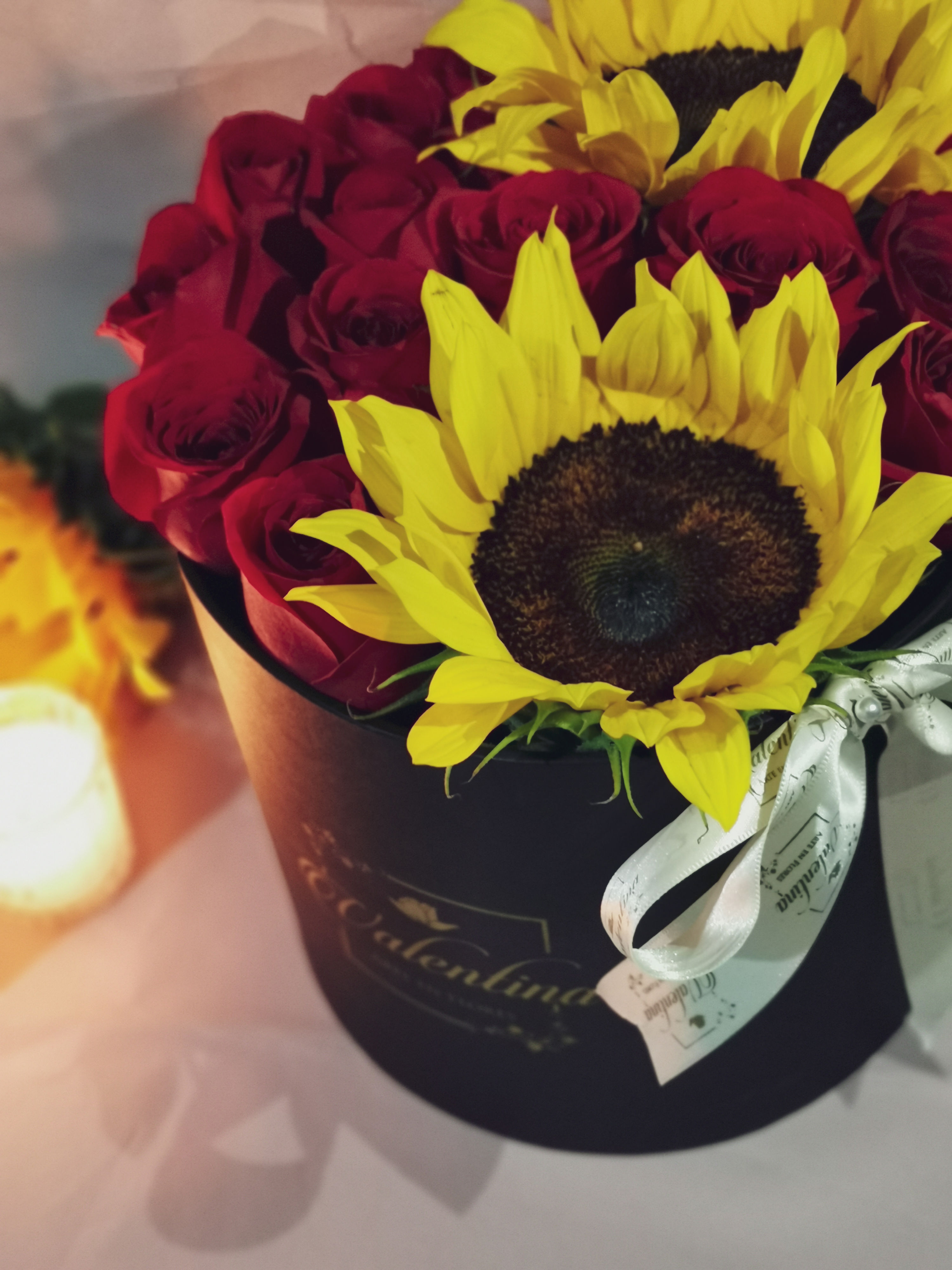 Arreglo floral rosas y girasoles