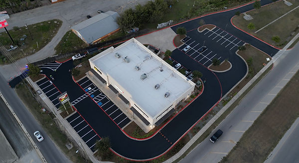 sealcoating and striping services in rouns rock tx
