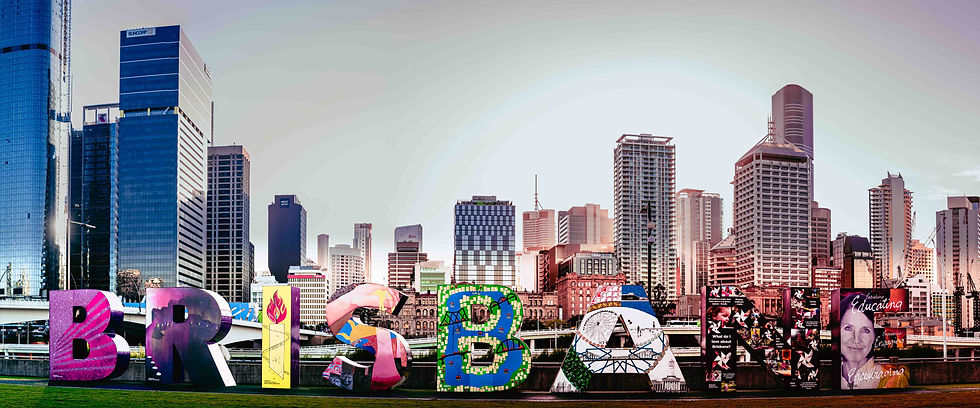 The iconic Brisbane sign at Southbank Parklands with the city skyline in the background - one of the three cities we're considering for our move back to Australia.