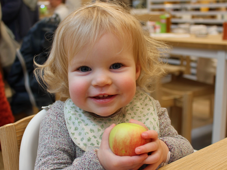 Granddaughter Grandchild Grandkid eating in a garden centre for free school summer holidays 2025 with grandparents nana grandad family friendly