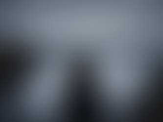 woman staring out at stormy ocean