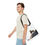 Thumbnail: Man carrying tote bag featuring a macaw