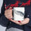 Thumbnail: Person holding a Ceramic Mug with Red-crowned Crane design