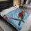 Thumbnail: Plush blanket featuring a colorful bird on a branch