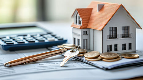 Calculator, house model, keys and coins on paperwork — representing property management, rental pricing, and landlord finances in Chatham-Kent.