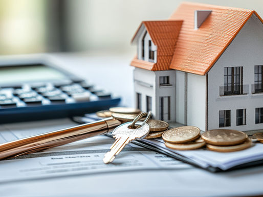 Calculator, house model, keys and coins on paperwork — representing property management, rental pricing, and landlord finances in Chatham-Kent.