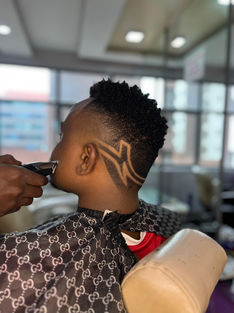 A picture of a man being shaved
