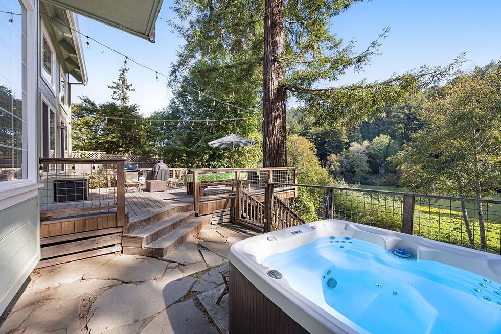 A hot tub with river views