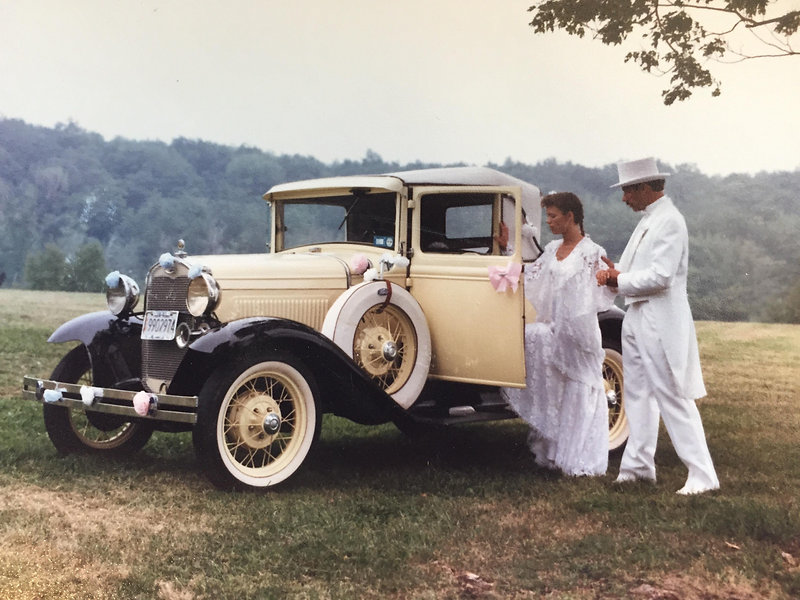 Young Couple With Model A Ford