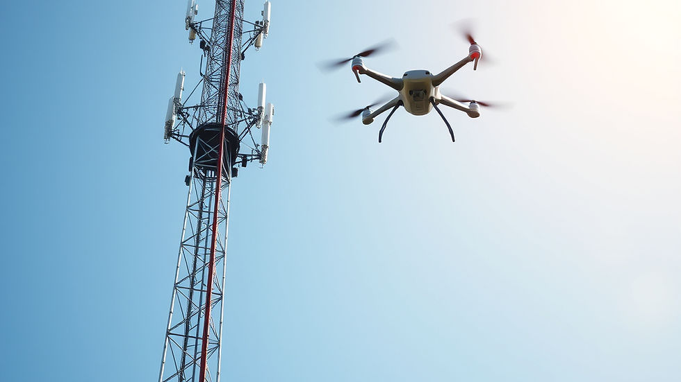 drone flying to the side of a telecoms tower on a clear day.jpg