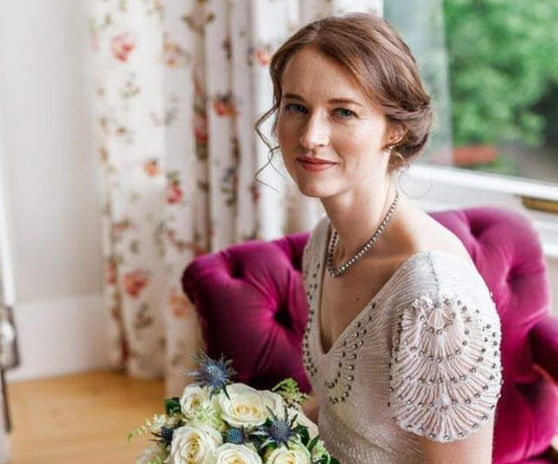 Jenna with her horizontal roll wedding hair updo - Sam Kerr Bridal Hair