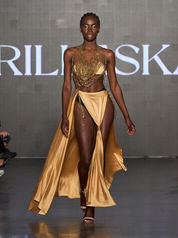 runway model in gold