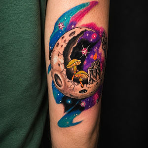 Cosmic crescent moon tattoo with mushrooms and stars