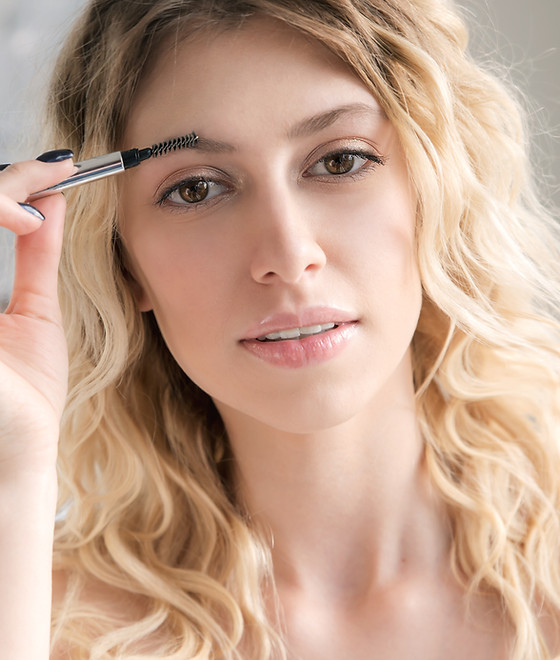 Woman with Brow Brush