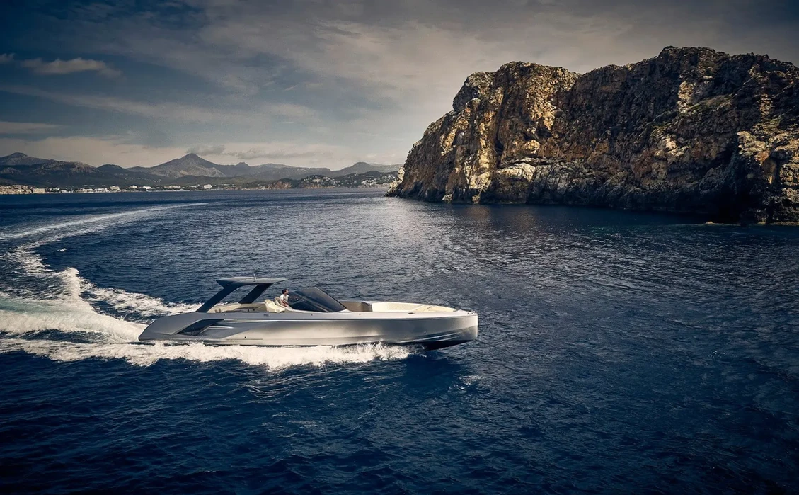 frauscher 1414 demon air cruising at speed on the french riviera with sleek open design and luxury deck layout