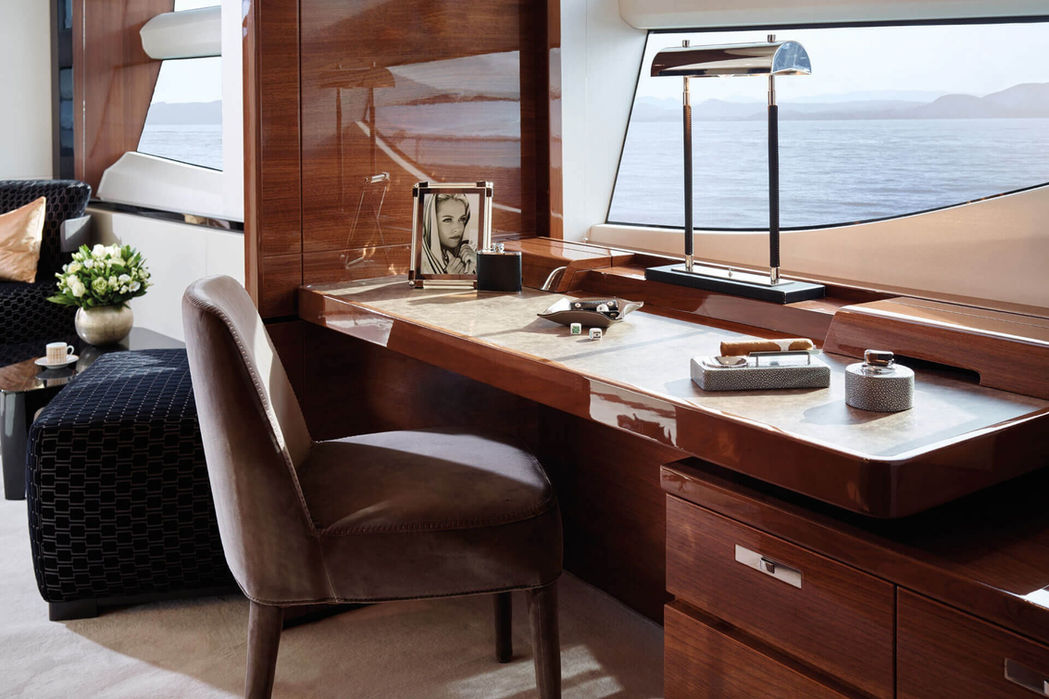 Quiet office area inside the Princess 35M master suite with desk and sea views.