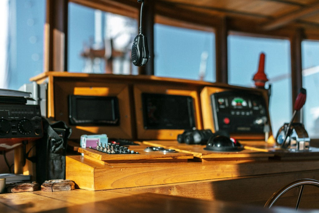 Interior desk and detail onboard Leyla Phinisi luxury yacht with Navélia Yacht Charters Indonesia in Komodo.