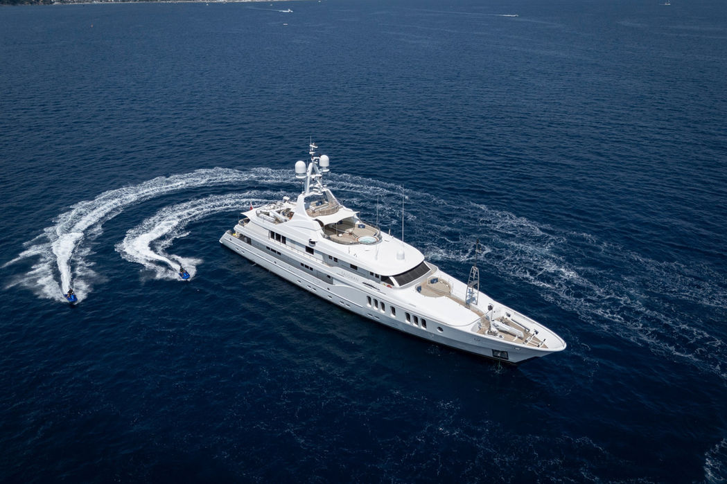 Luxury yacht Talisman Maiton cruising offshore, aerial view, Mediterranean charter