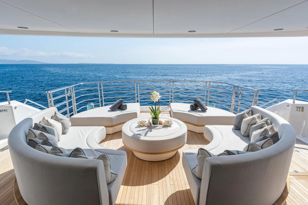 Aft deck lounge on Thumper with ocean views and comfortable seating.