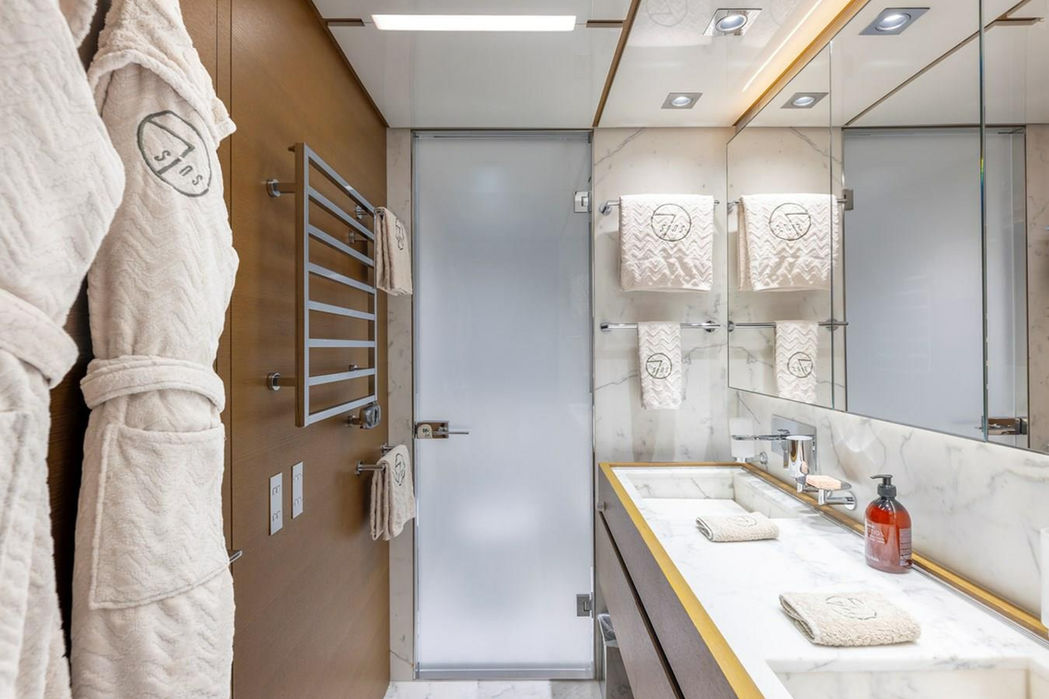 Luxury yacht Seven Sins spa-style bathroom with rainfall shower and premium amenities