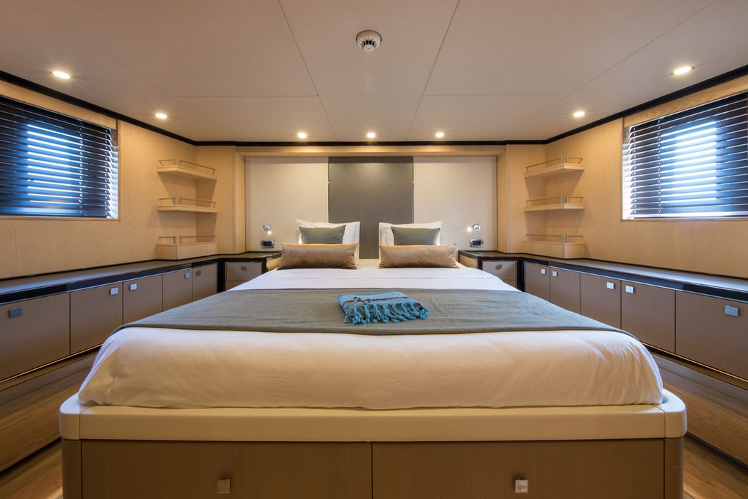 Master cabin on Sea Story yacht featuring a large bed and spacious layout