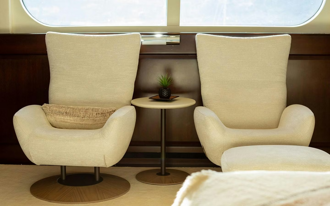 Cozy relaxation chairs in the interior lounge of M/Y Maximilian MMIV