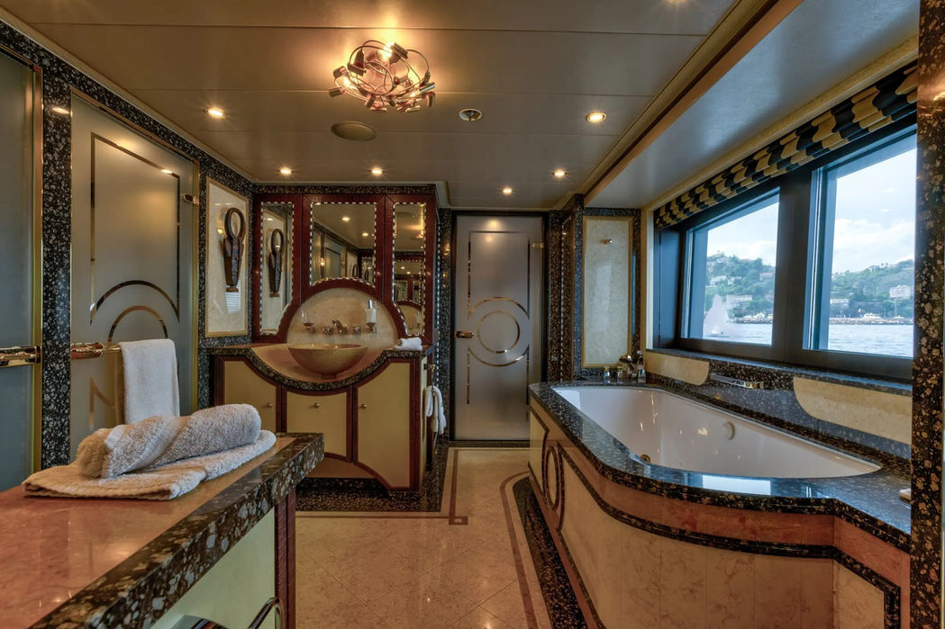 Luxury yacht Deniki central staircase and guest lobby