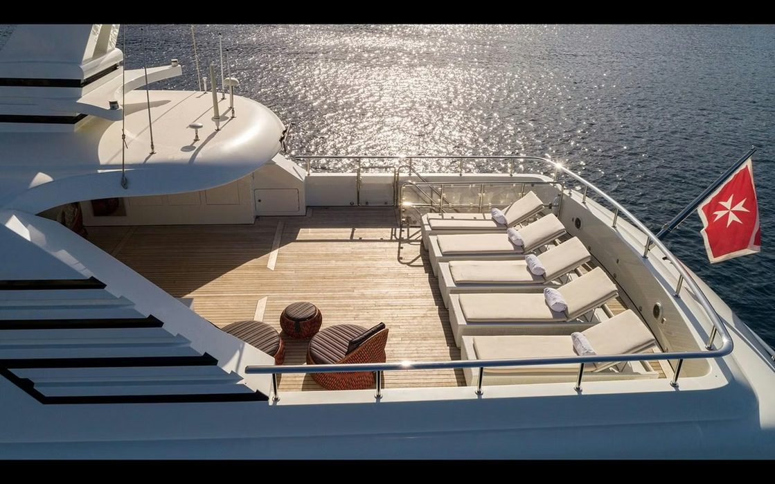 Upper deck sun area of M/Y Maximilian MMIV overlooking the Riviera coastline