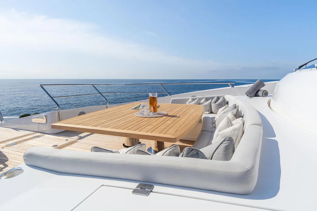 Forward bow sunpad lounge on Thumper with spacious tanning area overlooking the sea.