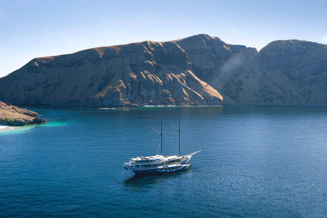 Scubaspa ZEN anchored in a calm bay during Indonesia yacht charter