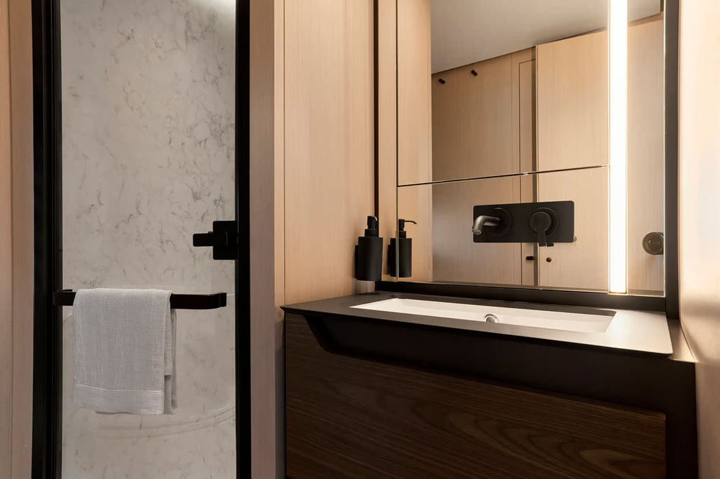 Modern ensuite bathroom with marble finishes on the Azimut S8.