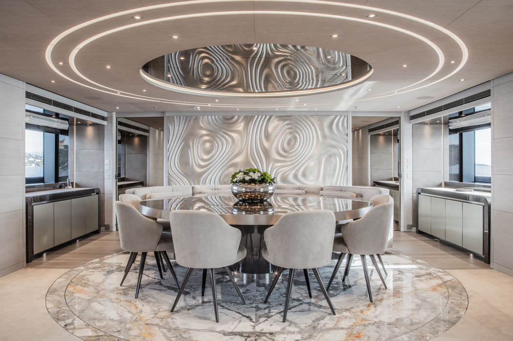Elegant secondary dining salon on Severin’s superyacht, perfect for hosting intimate gatherings during Saint-Tropez charters.