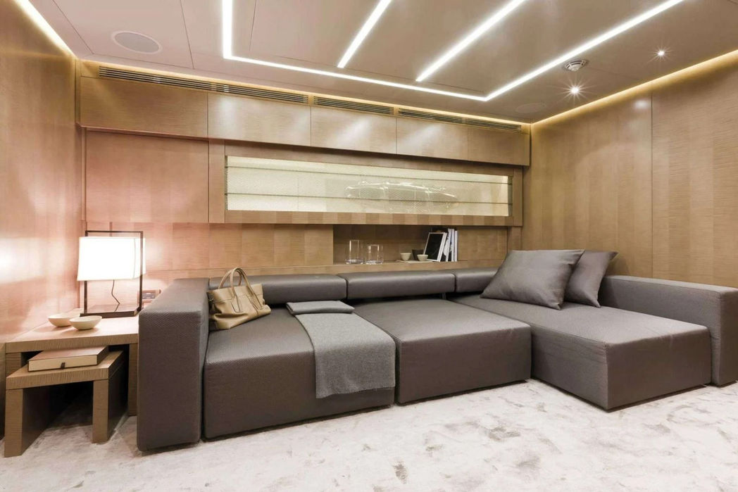 Comfortable lounge space aboard the Pershing 108 featuring modern interior design.