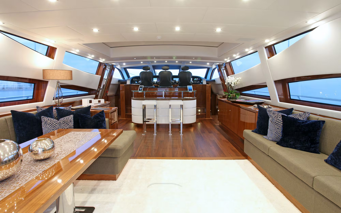Main salon on Phoenician yacht offering bright seating and full Mediterranean views