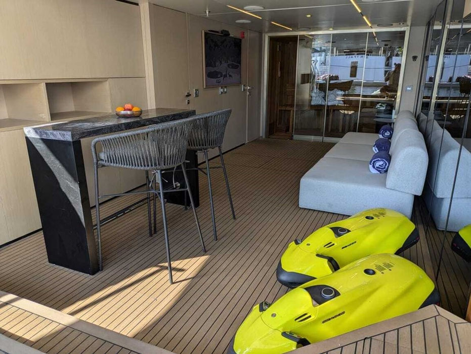 Open beach club garage on the Provocateur superyacht showing water toys and gear—perfect for active yacht charters around Cannes and Saint-Tropez.