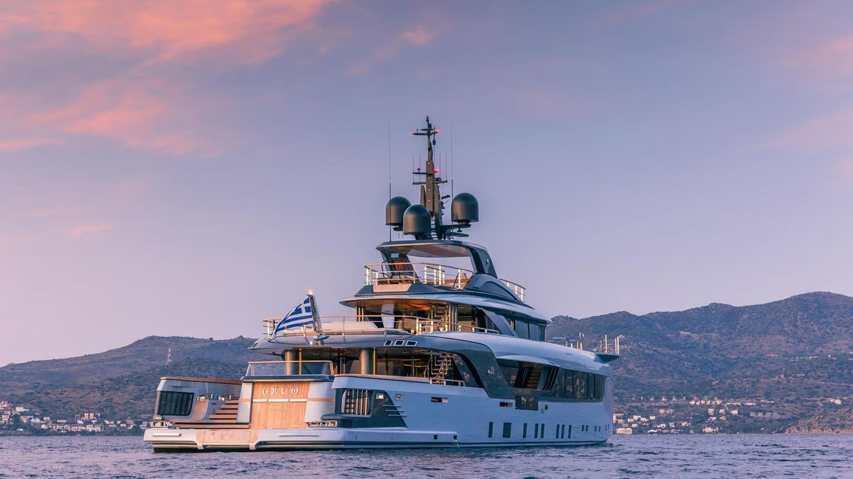 Aerial running shot of GECO luxury superyacht at sea with Navélia Yacht Charters