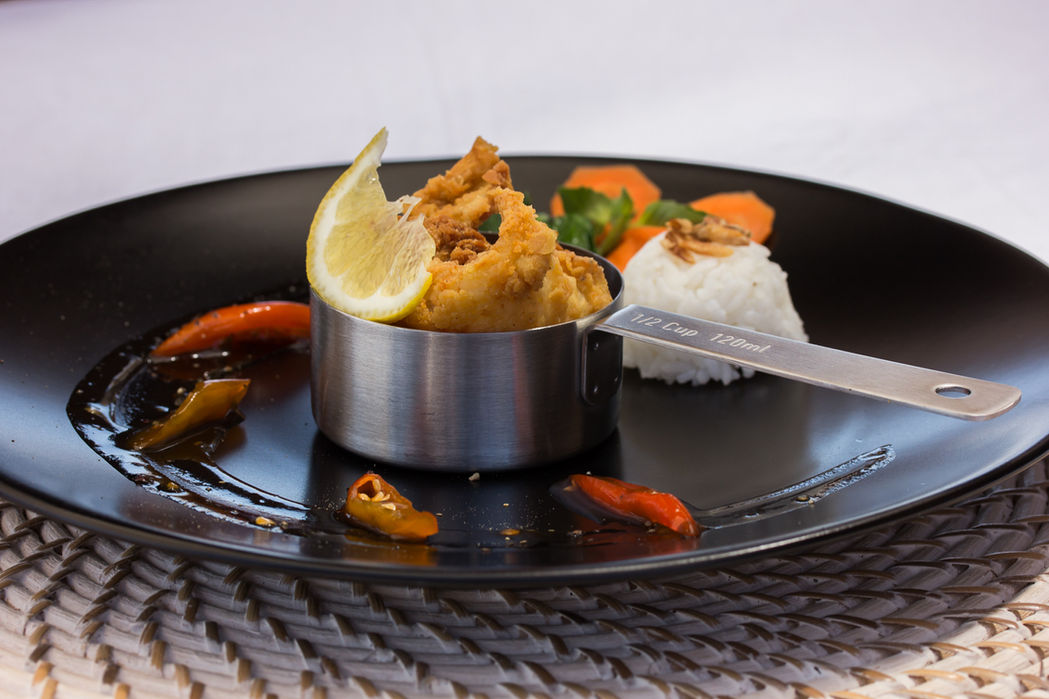 Plated dining experience onboard Siloina Phinisi luxury phinisi yacht in Komodo with Navélia Yacht Charters Indonesia.