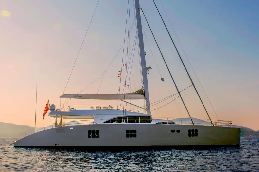 Ipharra catamaran anchored offshore during a Mediterranean multi day charter