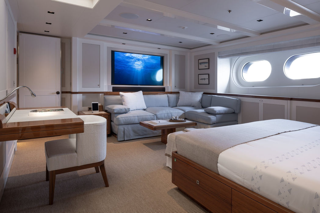 Light-filled twin cabin on Blue II featuring modern neutral design