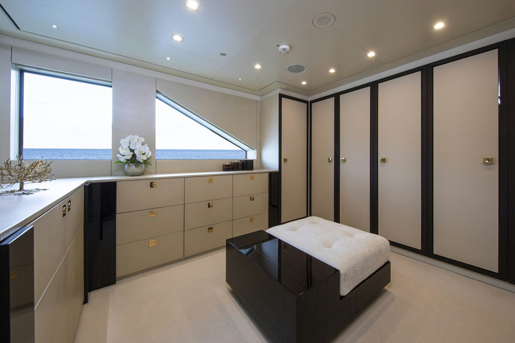 Bright guest corridor inside Roma superyacht during a Monaco charter.