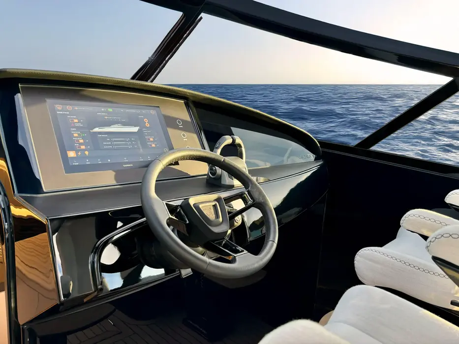 Steering position and navigation screens aboard Wajer 38 yacht