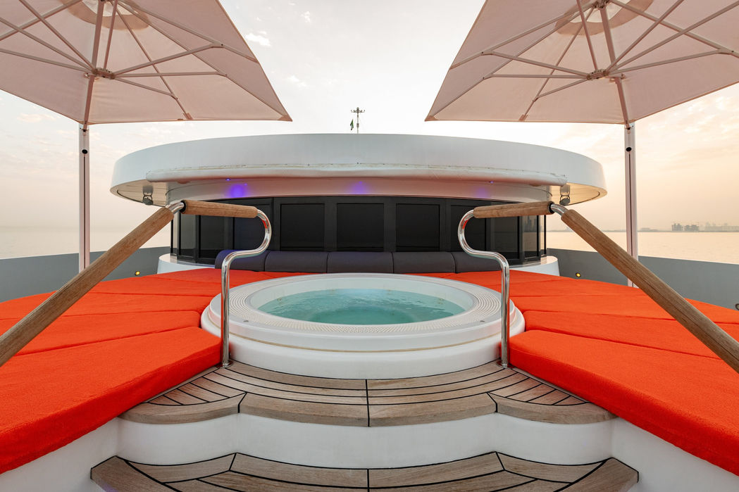 Jacuzzi lounge area on the bow of Moonlight II yacht with panoramic sea views
